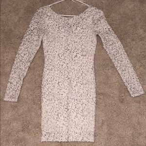 Long sleeved white dress with shiny print!